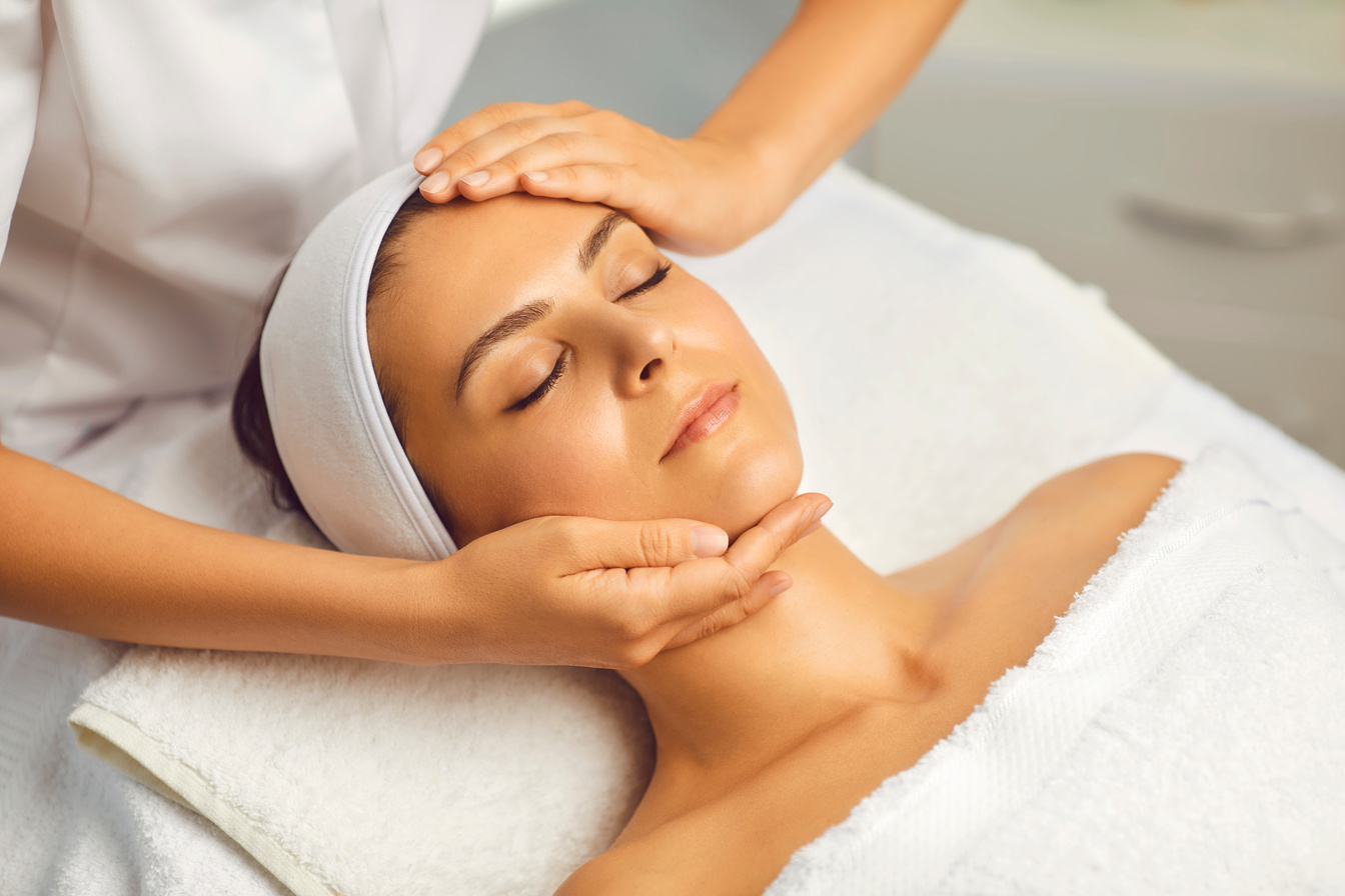 Facial Treatment, Massage, Skincare, Cosmetology Concept .Cosmetologist in Beauty Spa Salon